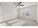 Bedroom with carpeted floors, ceiling fan and two windows allowing plenty of natural light at 14317 Banister Dr, Noblesville, IN 46060