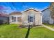 Charming single-story home featuring a well-maintained lawn and inviting curb appeal at 14317 Banister Dr, Noblesville, IN 46060
