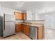 Kitchen with stainless steel appliances, granite countertops, and ample cabinet space at 14317 Banister Dr, Noblesville, IN 46060