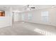 Spacious living room with carpet, neutral walls, and plenty of natural light at 14317 Banister Dr, Noblesville, IN 46060