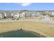 Neighborhood aerial view showing the property's location near a pond at 1444 Waterleaf Dr, Westfield, IN 46074