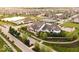 Stunning aerial view of the community clubhouse, tennis courts, and pool at 1444 Waterleaf Dr, Westfield, IN 46074