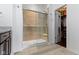 This bathroom has a glass door shower and a view of a walk-in closet at 1444 Waterleaf Dr, Westfield, IN 46074
