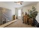 This bedroom includes a ceiling fan and window at 1444 Waterleaf Dr, Westfield, IN 46074