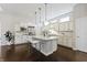 Modern kitchen featuring white cabinets, granite countertops, and stainless steel appliances at 1444 Waterleaf Dr, Westfield, IN 46074