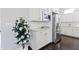 Well-equipped kitchen with white cabinets, stainless steel appliances, and granite countertops at 1444 Waterleaf Dr, Westfield, IN 46074