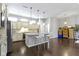Bright kitchen with stainless steel appliances, granite countertops, and a large island at 1444 Waterleaf Dr, Westfield, IN 46074