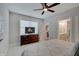 Bedroom featuring a dresser with TV, carpet, and ceiling fan at 1472 Windpump Way, Carmel, IN 46280