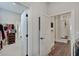 Hallway view of access to the closet, bedroom, and laundry room at 1472 Windpump Way, Carmel, IN 46280