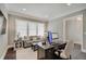 Well-lit office with comfortable seating, desk, and stylish decor at 1472 Windpump Way, Carmel, IN 46280