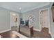 Office with large desk, view to hallway, and comfortable seating at 1472 Windpump Way, Carmel, IN 46280