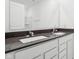 Bathroom featuring a double sink vanity with modern fixtures and ample storage at 1554 N Clearwater Dr, Greenfield, IN 46140