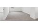 Neutral bedroom with carpeted floors, a window and a connecting doorway at 1554 N Clearwater Dr, Greenfield, IN 46140