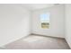 Bedroom featuring carpet flooring and a bright window that brings in natural light at 1554 N Clearwater Dr, Greenfield, IN 46140