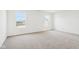 Bright bedroom with carpet flooring and windows at 1554 N Clearwater Dr, Greenfield, IN 46140