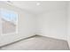Well lit bedroom with neutral carpet, and a bright window at 1554 N Clearwater Dr, Greenfield, IN 46140