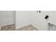 Bright laundry area featuring tile flooring and washer/dryer hookups at 1554 N Clearwater Dr, Greenfield, IN 46140