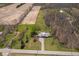 Aerial view of single-Gathering home featuring a long driveway and large lawn at 16471 E 196Th St, Noblesville, IN 46060