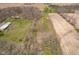 Areal view showing fields, barn, and mature trees on this picturesque country property at 16471 E 196Th St, Noblesville, IN 46060