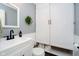 Well-lit bathroom with modern fixtures, a clean white vanity, and ample storage space at 16471 E 196Th St, Noblesville, IN 46060