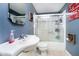 Cozy bathroom featuring a clean vanity and a shower-tub combination, complete with modern fixtures at 16471 E 196Th St, Noblesville, IN 46060