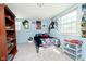 Spacious bedroom with carpet flooring, ample sunlight from two windows, and a decorative theme at 16471 E 196Th St, Noblesville, IN 46060