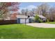 Beautiful blue single-story home featuring an attached garage and spacious yard at 16471 E 196Th St, Noblesville, IN 46060