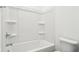 All white bathroom featuring a shower/tub combo and toilet at 19245 Red Willow Ln, Noblesville, IN 46062