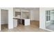 Modern kitchen with stainless steel appliances, island, and access to outdoor space at 19245 Red Willow Ln, Noblesville, IN 46062