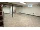 Finished basement offering potential for additional living space and full bathroom at 2050 Winton Ave, Indianapolis, IN 46224