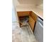 A pull out shelving system installed in the corner cabinet of the kitchen at 2050 Winton Ave, Indianapolis, IN 46224