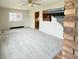 A view of the living room showcasing a fireplace and an adjacent view into the kitchen at 2050 Winton Ave, Indianapolis, IN 46224