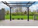 Deck with a pergola overlooking a large, green backyard at 2236 Willowview Dr, Indianapolis, IN 46239