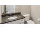 Bathroom featuring a granite countertop and a vanity with white cabinets at 2236 Willowview Dr, Indianapolis, IN 46239