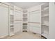 Large walk-in closet featuring custom shelves and ample storage space at 2236 Willowview Dr, Indianapolis, IN 46239