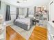 Bedroom featuring hardwood floors, neutral paint, and a trundle bed at 2329 E 8Th St, Anderson, IN 46012