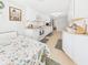 Bright eat-in kitchen featuring white cabinetry, stainless steel appliances, and breakfast nook at 2329 E 8Th St, Anderson, IN 46012