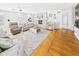 Spacious living room featuring hardwood floors, neutral colors, and cozy seating at 2329 E 8Th St, Anderson, IN 46012
