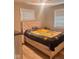 Cozy bedroom featuring a wood-framed bed with a decorative blanket at 2517 Horton Dr, Anderson, IN 46011