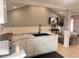 Bright kitchen showcasing marble countertops, black sink fixtures, and stylish white cabinets at 2517 Horton Dr, Anderson, IN 46011