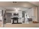 Open kitchen features stainless steel appliances, white cabinets, and marble-style countertops at 2517 Horton Dr, Anderson, IN 46011