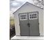 Exterior view of a shed featuring gray doors, windows, and an inviting entrance at 2517 Horton Dr, Anderson, IN 46011