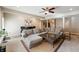 Relaxing finished basement featuring a comfortable sectional sofa, and a ceiling fan at 267 Westbrook Ct, Columbus, IN 47201