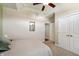 Bedroom with vaulted ceilings, double door closet, beige carpet, and a queen bed at 267 Westbrook Ct, Columbus, IN 47201