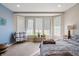 Bright bedroom featuring a bay window with a cozy sitting area at 267 Westbrook Ct, Columbus, IN 47201