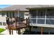 Inviting outdoor deck with a screened-in porch, perfect for relaxing and entertaining at 267 Westbrook Ct, Columbus, IN 47201