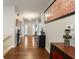 Inviting foyer with hardwood floors, elegant lighting, and unique decor at 267 Westbrook Ct, Columbus, IN 47201