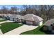 Charming brick and siding home with a well-manicured lawn and spacious driveway at 267 Westbrook Ct, Columbus, IN 47201