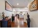 Welcoming foyer featuring hardwood floors and elegant decor, leading to the living spaces at 267 Westbrook Ct, Columbus, IN 47201