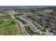 Aerial view of a quiet residential neighborhood with well-maintained homes and tree-lined streets at 267 Westbrook Ct, Columbus, IN 47201